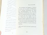 someone is holding a book open to a page with a picture on it