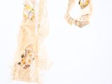two pieces of clothing hanging on a clothes line