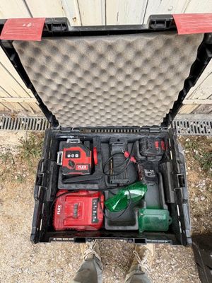 a tool box with tools in it on the ground