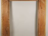 an old picture frame with a wooden pattern on it