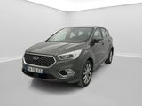 une Ford Kuga grise garée dans une pièce blanche