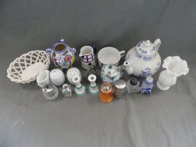many different types of vases and bowls on the table