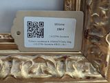 a picture of a gold frame with a qr code on it