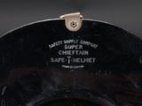 an image of a close up of a black bowl with a label on it