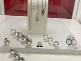 a display case with many different rings and rings on it