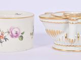 two cups that are next to each other on a table