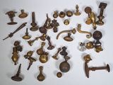 many different types of brass objects on the table