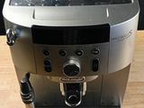 a coffee machine that is sitting on a wooden table