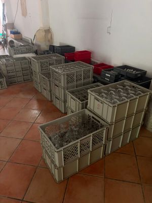 many crates that are lined up on the floor