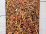 une peinture abstraite représentant un arbre aux feuilles orange et jaunes