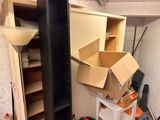 a box that is sitting on top of a carton in a room