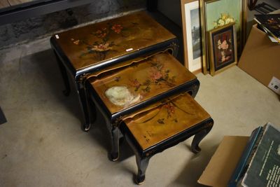 three small tables that are sitting on the floor