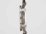 an image of a close up of a watch on a white surface