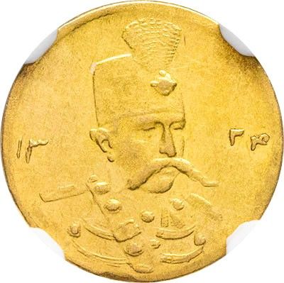 a close up of a gold coin with a man on it
