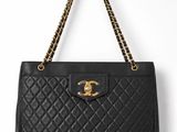 a chanel black quilted leather shoulder bag with gold hardware