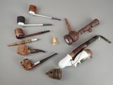 many different types of pipes and pipes on the table