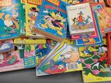 a lot of books that are sitting on a table