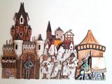 a lot of wooden toys that are on the wall