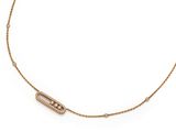 a gold necklace with a diamond bar on a chain