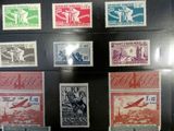 several different types of stamps on display in a display case