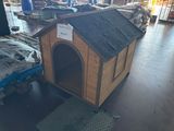 a dog house that is in the middle of the floor