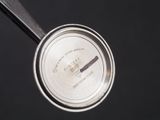 a close up view of a metal pan with a lid