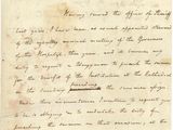 lettre manuscrite écrite à l'encre noire sur une feuille de papier