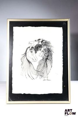 dessin représentant une femme et un cheval, encadré, posé sur une table