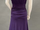 a woman ' s purple dress on a mannequin mannequin mannequin mannequin mannequin mannequin mannequin mannequin
