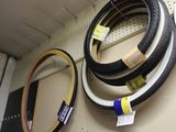 many tires on the wall in a store