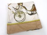 beige and brown scarf with a bicycle and carriage on it