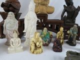 many figurines that are sitting on a table