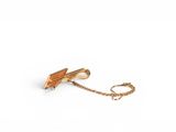 an image of a pair of gold cufflinks with a chain