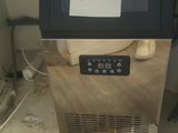 a picture of a small ice cream machine on a counter
