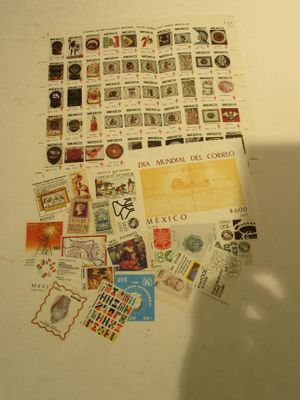 a picture of a table with a bunch of stamps on it