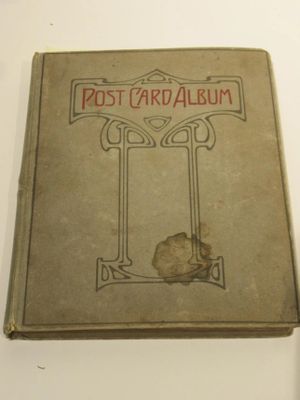 an old book with a picture of a cat on it