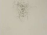 an image of a drawing of a man ' s face on a piece of paper