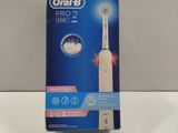 a box of toothbrushes sitting on a table