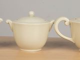 three cups sitting next to each other on a table