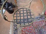 a chair that is sitting on a rug on the floor