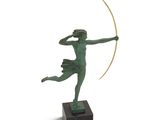 an image of a statue of a woman with a bow and arrow