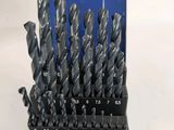 a set of drill bits in a blue case on a table
