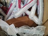 a box full of toothbrushes and toothpaste wrapped in plastic