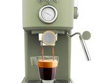 an image of a green coffee machine with a cup of coffee