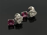 une paire de boucles d'oreilles en rubis et diamants