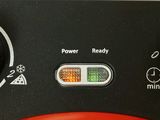 an image of a close up of a red and black radio