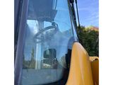 a close up of the front of a yellow bulldozer