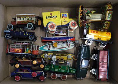 a box full of toy cars and trucks in it
