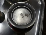 a close up of a metal pan on a stove top