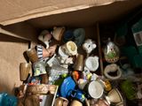 a cardboard box filled with many different types of items